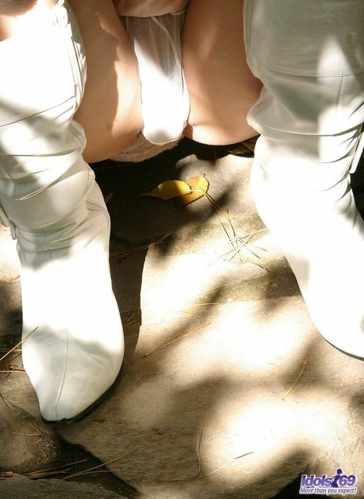 Japanese model Nana exposes her tits and bush in white latex boots - #2