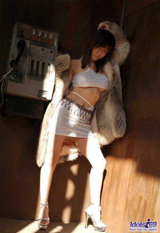 Japanese model Sakura Shiratori thrusts her big tits forward once she's naked - #12