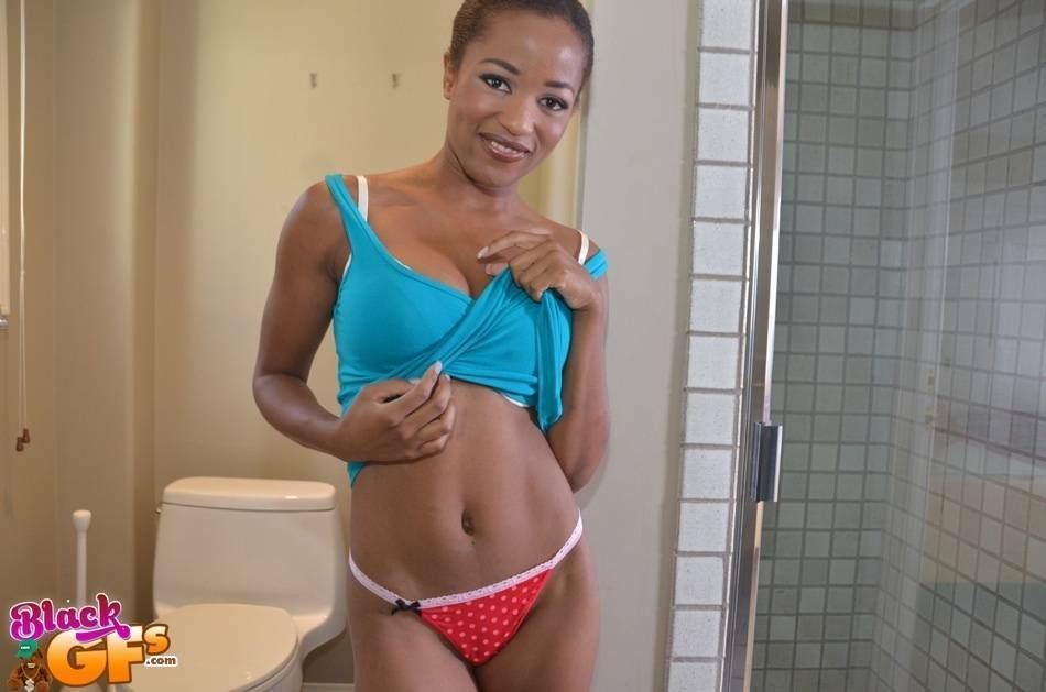 Charming ebony babe with big natural boobs plays with her tits in a bathroom - #8