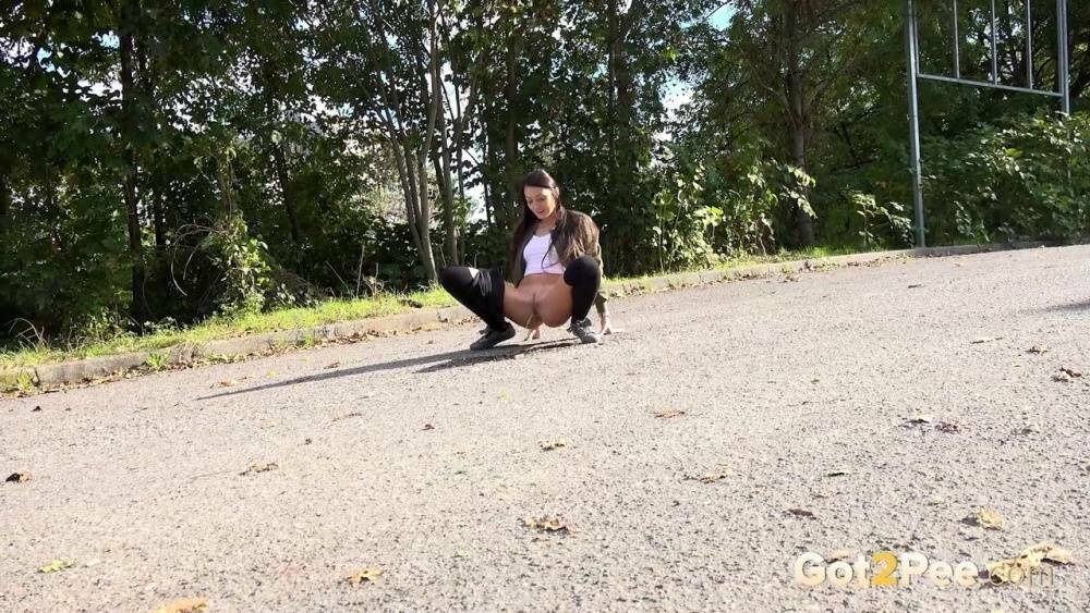 White girl Katy Rose takes a piss on a road while wearing hooker socks - #9