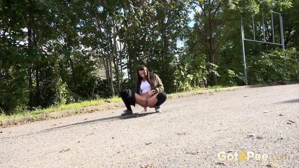White girl Katy Rose takes a piss on a road while wearing hooker socks - #5