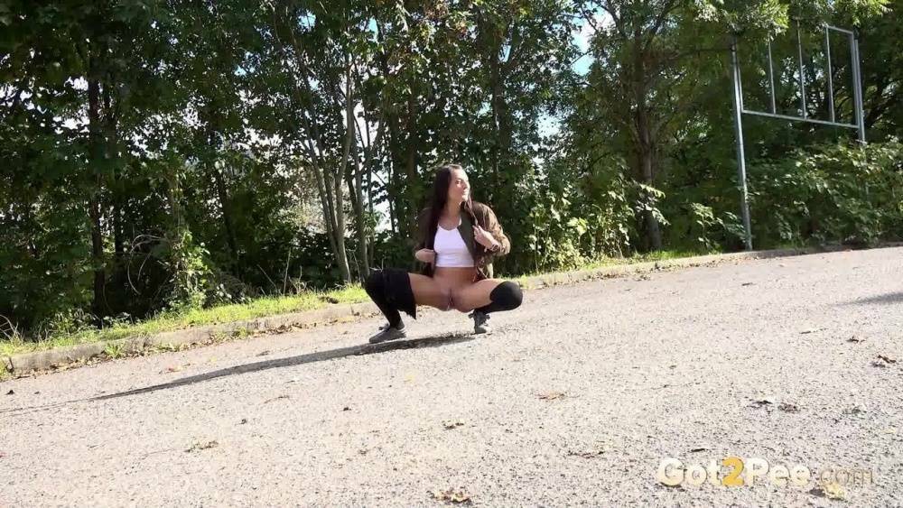 White girl Katy Rose takes a piss on a road while wearing hooker socks - #6