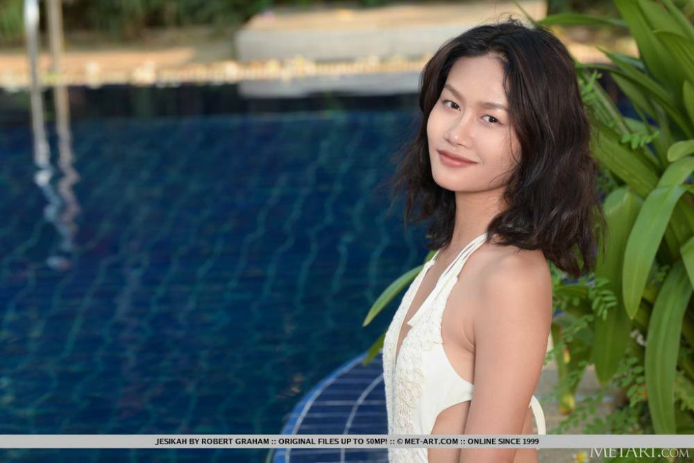 Asian teen Jesikah slips off a bathing suit to model naked near a pool - #5