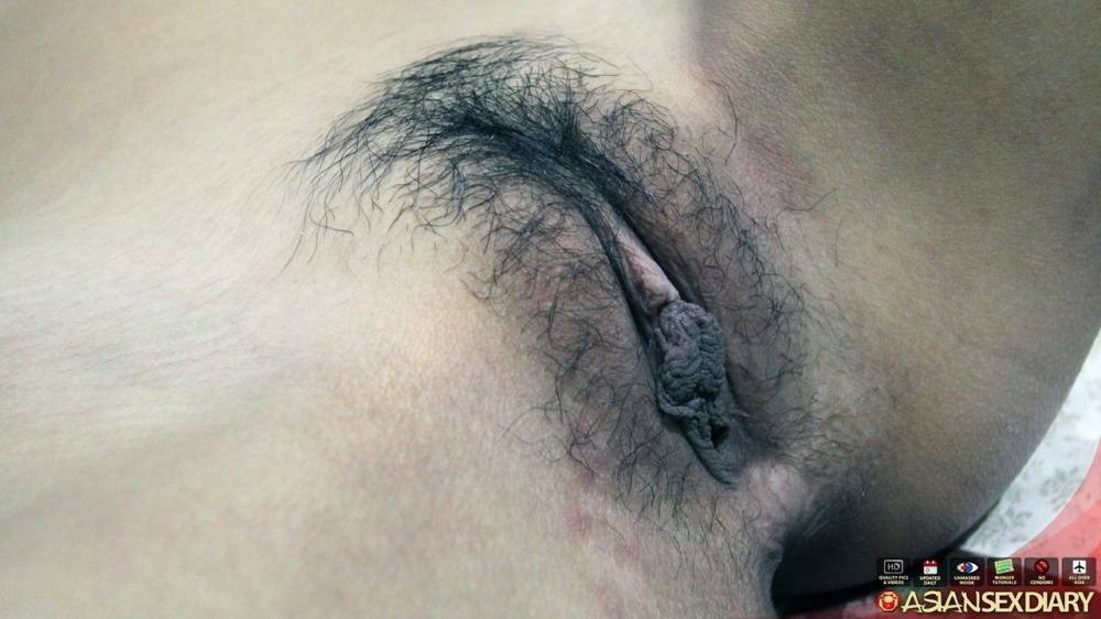 Horny Asian with very hairy pussy and nice big firm tits shows how to be a cum - #16