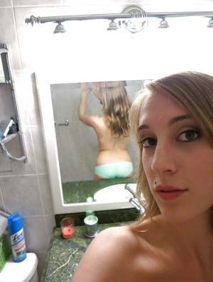 Smiley amateur Cadence Lux stripping and picturing herself in the bath on picsfans.one