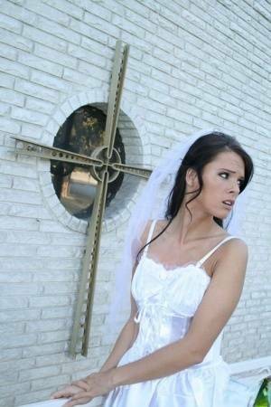 MILF babe in bride's dress Jennifer Dark spreading pussy on picsfans.one